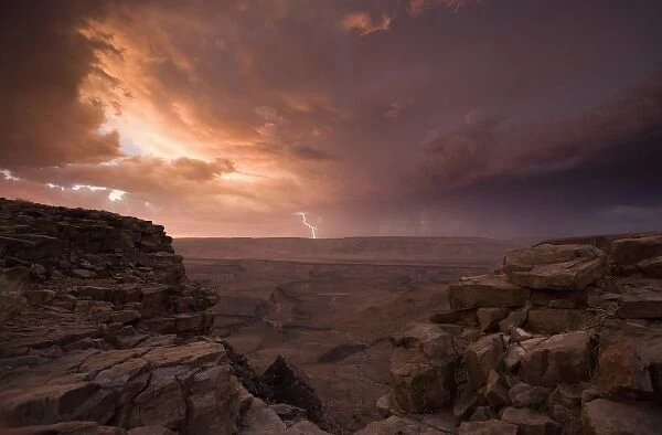 Namibia, Fish River Canyon National Park, Lightning strikes from storm clouds above