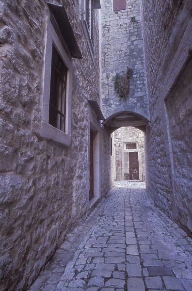 A narrow cobbled street in the back roads area of old town Trogir. Central Dalmatia
