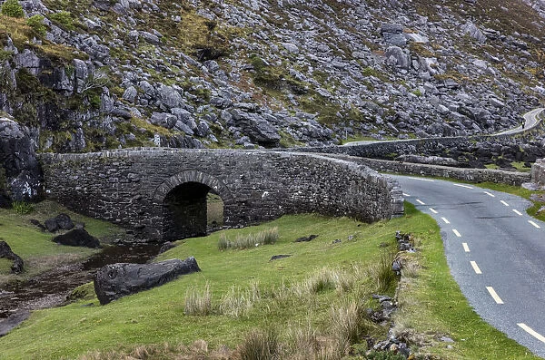Narrow roadway over stone bridge at the Gap of Dunloe near Killarney, Ireland