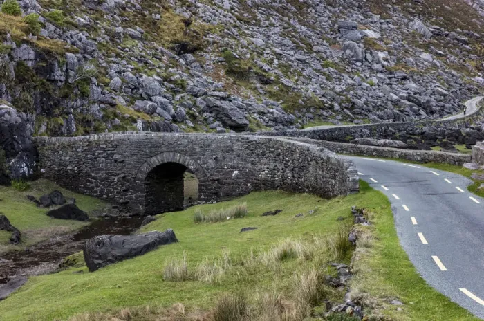 Framed Print : Narrow roadway over stone bridge at the Gap of Dunloe near Killarney, Ireland