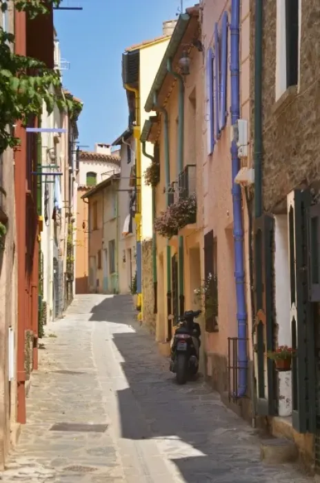 Framed Print : A narrow street in the old town. Collioure. Roussillon. France. Europe. Colourful houses