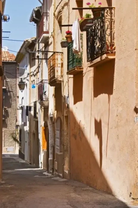 Framed Print : Narrow village street. Bouzigues Languedoc. France. Europe Framed Print : Narrow village street. Bouzigues Languedoc. France. Europe