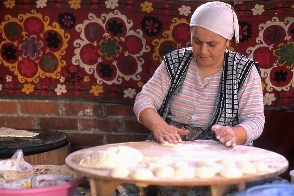 Native woman making bread in Istanbul Turkey (MR)