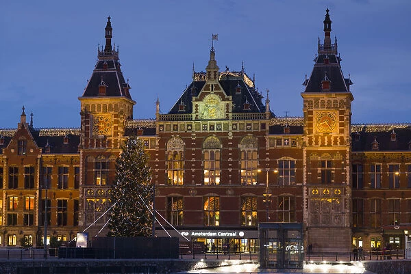 Netherlands, Amsterdam, Amsterdam Central Train Station, exterior, dawn