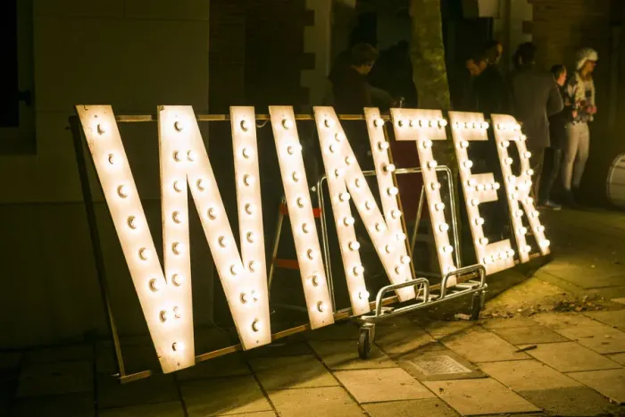 Framed Print : Netherlands, Amsterdam, signs for the Winter Parade, evening
