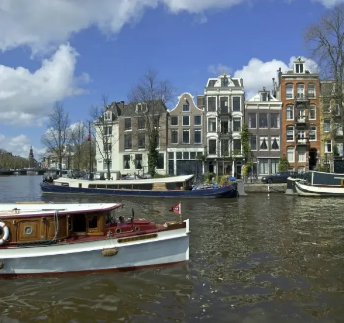 Framed Print : Netherlands, North Holland, Amsterdam, Canal boats at River Amstel and the Zwanenburgwal Framed Print : Netherlands, North Holland, Amsterdam, Canal boats at River Amstel and the Zwanenburgwal
