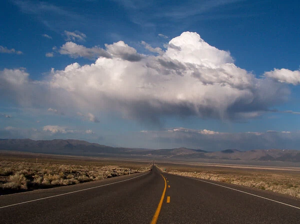 NEVADA. USA. Cumulus clouds over US Highway 50. The Loneliest Road in America'