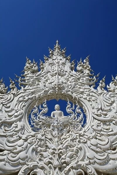 The new all white temple of Wat Rong Khun in Tambon Pa-Or Donchai designed by Chalemchai Kositpipat