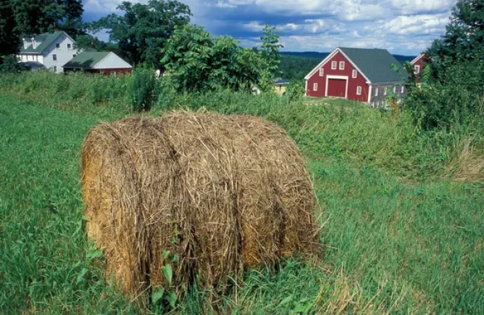Framed Print : New Gloucester, ME A bale of hay in a field near the barn at the Sabbathday Lake