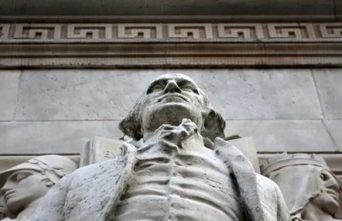 Framed Print : In New York City. Statues adorning the Washington Square arch in the West Village
