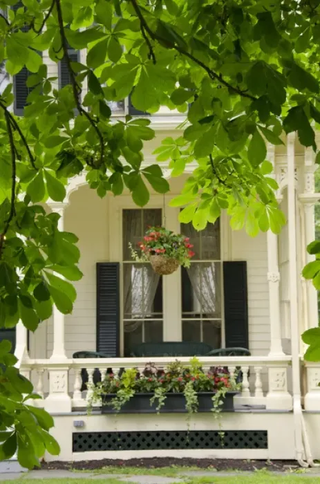 Framed Print : New York, Cooperstown. Typical historic Cooperstown home with flowers on veranda