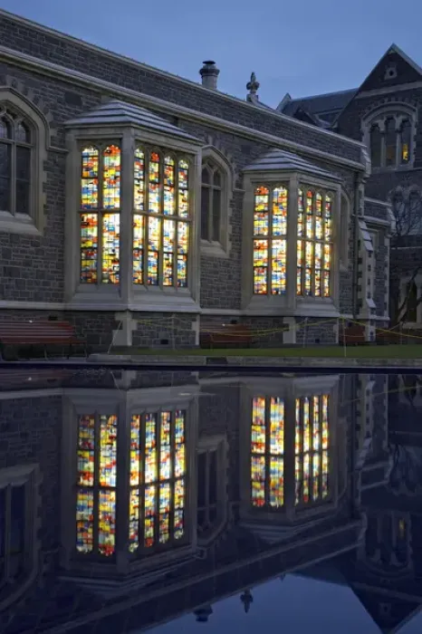 Framed Print : New Zealand, Canterbury, Christchurch, Windows of Sofa Gallery, Arts Centre at Dusk
