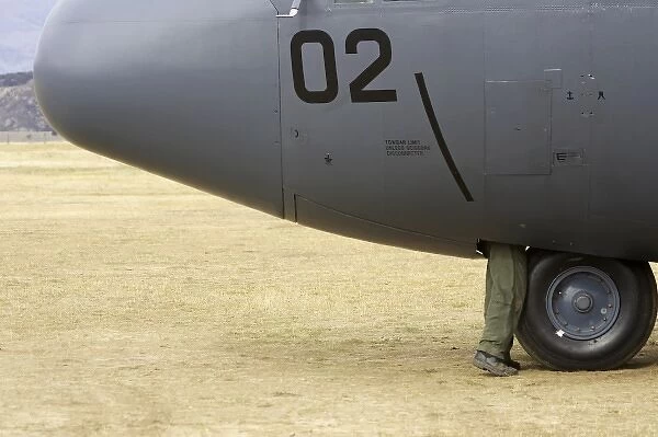 New Zealand, Otago, Wanaka, Warbirds Over Wanaka, Persons Legs and Lockheed C-130