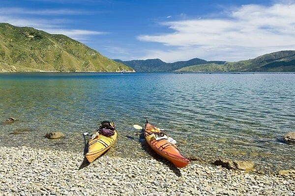 New Zealand, South Island, Marlborough Sounds. Sea kayaks on beach at Tawhitinui Reach