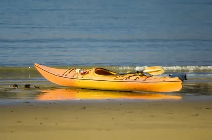Framed Print : New Zealand, South Island, Marlborough Sounds. Sea kayak on the beach at Titirangi Bay