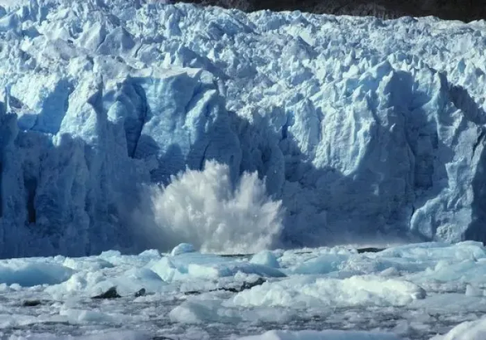 Framed Print : Newly-calved iceberg splashing into chilly waters  /  San Rafael Lagoon National Park