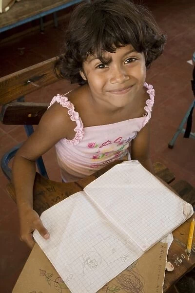Nicaragua, Granada. Girl in classroom at school in Santa Ana de Malacos. (MR)