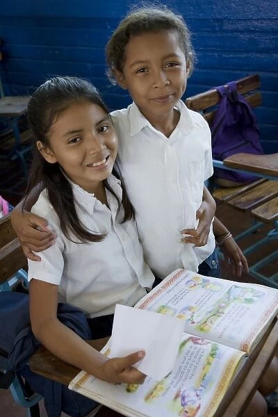 Nicaragua, Granada. Girls in classroom at school in Santa Ana de Malacos. (MR)