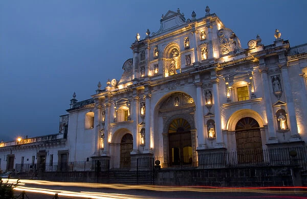 Night photo with traffic in front of famous Cathedral in square of Antigua Guatemala