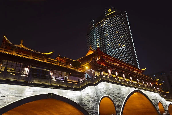 Night view of Anshun Bridge with modern high-rise, Chengdu, Sichuan Province, China