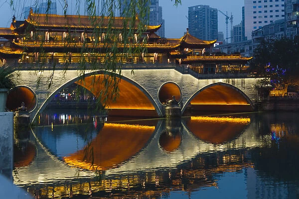 Night view of Anshun Bridge with reflection in Jin River, Chengdu, Sichuan Province