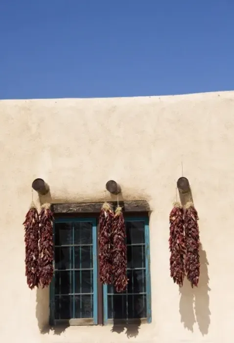Framed Print : NM, New Mexico, Taos, shop fronts at Taos Plaza, with chile ristras