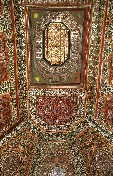 North Africa, Morocco, Marrakesh. Painted zellij woodwork ceiling at El Bahia Palace