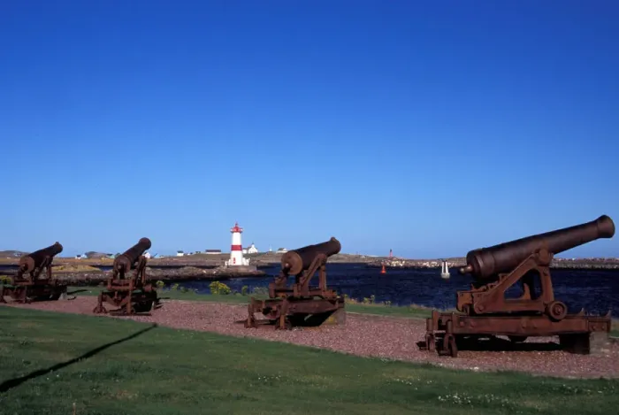 Framed Print : North America, Canada, Miquelon and St. Pierre, St. Pierre harbor lighthouse and cannons Framed Print : North America, Canada, Miquelon and St. Pierre, St. Pierre harbor lighthouse and cannons