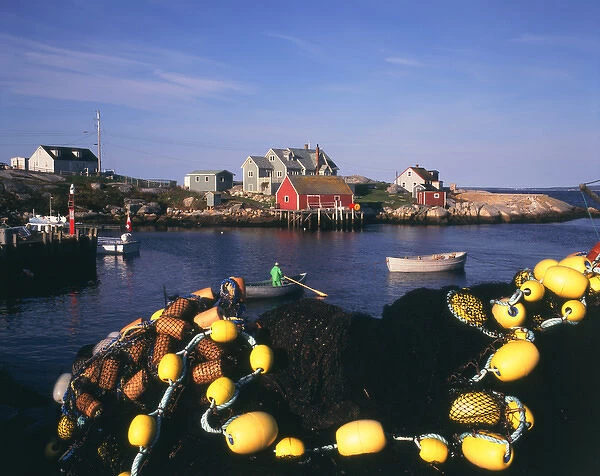 North America, Canada, Nova Scotia, Peggys Cove, fishing nets and houses