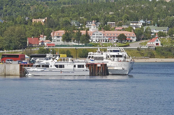 North America, Canada, Quebec, North Shore, Tadoussac. Whale watch boats and the Tadoussac Hotel