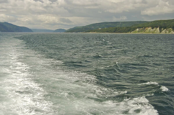 North America, Canada, Quebec, North Shore, Tadoussac. A view past the wake of a