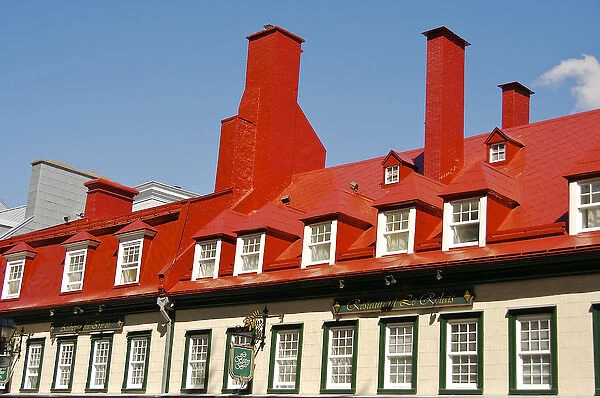 North America, Canada, Quebec, Old Quebec City. Upper windows and roof of a historic