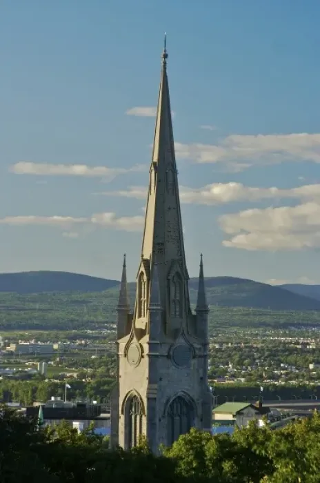 Framed Print : North America, Canada, Quebec, Old Quebec City. Church spire with mountains in disatnace