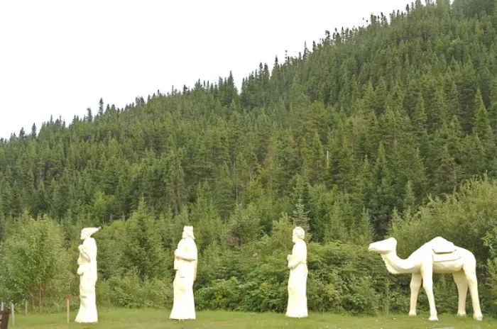 Framed Print : North America, Canada, Quebec, Saguenay, Riviere-Eternite. Figures near a sign announcing