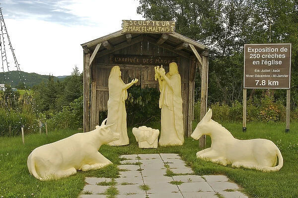 North America, Canada, Quebec, Saguenay, Riviere-Eternite. Creche and sign announcing