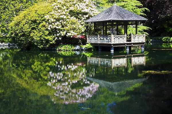 North America; Canada; Vancouver Island; Hately Gardens; Hut over Pond in Spring Garden
