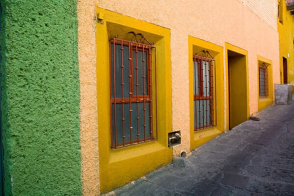 North America, Mexico, Guanajuato. Colorful building along street