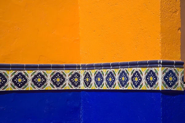 North America, Mexico, Guanajuato. Colorful wall with ornate tile