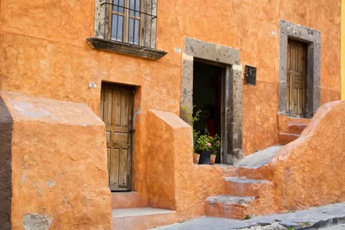 Framed Print : North America, Mexico, Guanajuato state, San Miguel. An orange colored stucco house