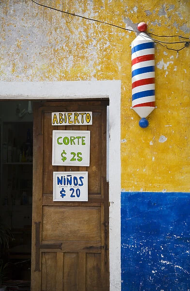 North America, Mexico, Guanajuato state, San Miguel. The entrance to a barber shop