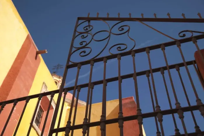 Framed Print : North America, Mexico, Guanajuato State, Guanajuato, detail of iron gate in fron tof yellow