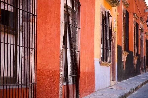 North America, Mexico, Guanajuato state, San Miguel de Allende. Colorful houses along the street