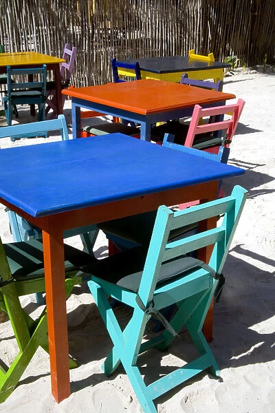 North America, Mexico, Quintana Roo, Tulum. Colorful table settings at a cafe
