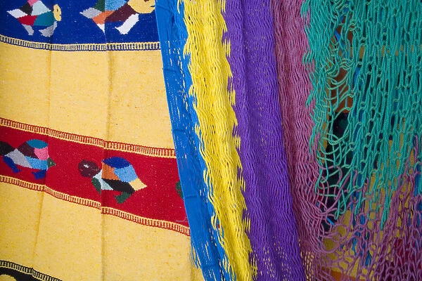 North America, Mexico, Quintana Roo, Tulum. A colorful display of a hammock
