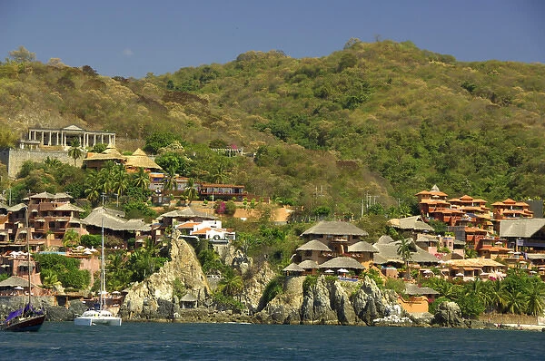 North America, Mexico, State of Guerrero, Zihuatanejo. Resort lined coast of Zihuatanejo