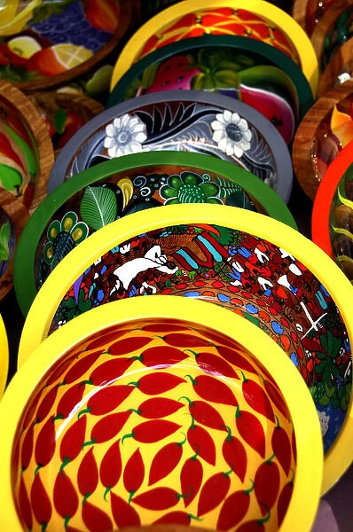 North America, Mexico, State of Guerrero, Acapulco. Colorful wooden bowls handpainted