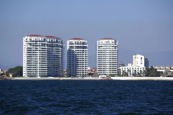 North America, Mexico, State of Jalisco, Puerto Vallarta. Hotel lined coastline
