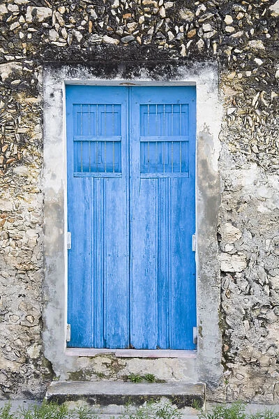 North America, Mexico, Yucatan, Izamal. A colorful blue door in the colonial city