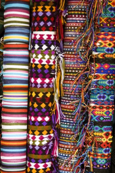 Framed Print : North America, Mexico, Yucatan, Merida. Woven bracelets on bolts for sale in a shop