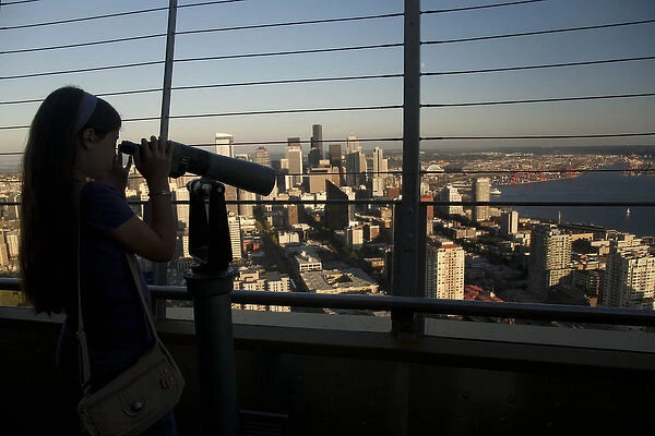 North America, United States, Washington, Seattle, girl with telescope on top of